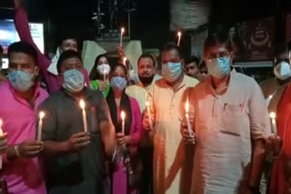 bjp youth take out candle march