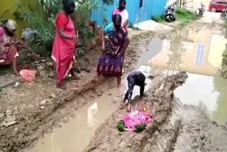 public protest by holding a funeral for the damaged road