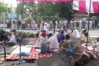 Farmers continue their demonstration outside mini secretariat in Karnal,