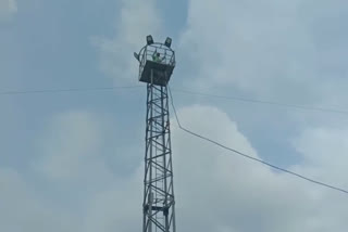 man climb tower