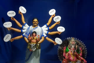mamata-banerjee-is-depicted-as-devi-durga-in-ganeshpujo-at-malda
