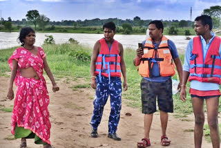 Villagers stranded on an island between rivers