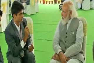 pm-interaction-with-paralympic-medalist-suhas-yathiraj
