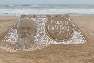 Modi sand sculpture with 2035 seashells