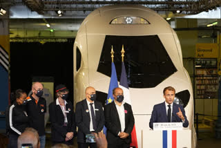 France's Macron unveils model of new, green high-speed train