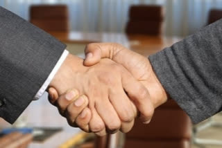 joint hand with companies