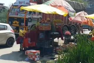 highway encroached by vendors, people facing traffic in anantnag