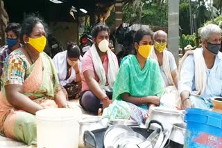 Brothers sitting protest in front of their father's house for property issue