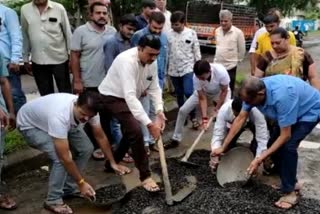 Rajkot City Congress Repaired potholes