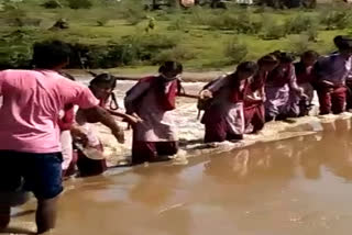 Students forced to cross the river to go to school