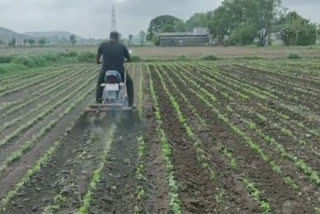 Viral Video : Farmer plows in farm by bike