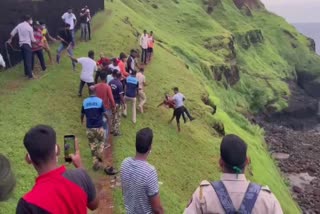 young man stuck in middle of valley at Ratnadurg fort