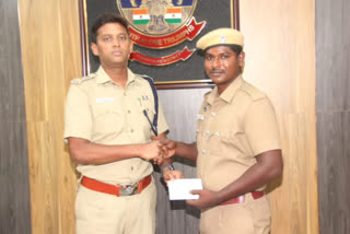 District Superintendent Varunkumar rewarded cop for chasing chain snatchers