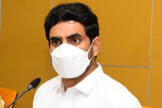 tdp leader lokesh fires on ycp over land mafia