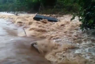 auto-washed-down-the-river