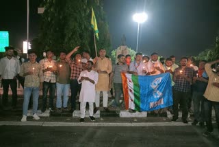 NSUI workers take out candle march