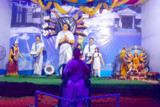 mamata banerjee depicted as goddess durga-with-hands-full-of-schemes