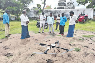 Revenue staff taking measurements with the help of a drone