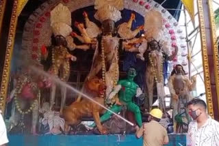 29 feet tall durga immersion by fire brigade in jalpaiguri