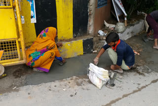 market organisation preparing road in madi nagar