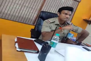 an inSpector abuses a person by bad words at bangalore