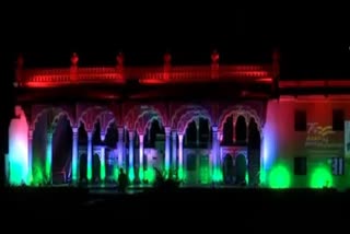 100 monuments lit up with tricolor light