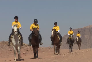 Horses gallop through Jordan's desert in int'l race