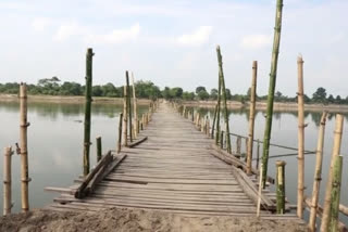 longest bamboo bridge in assam connecting two districts