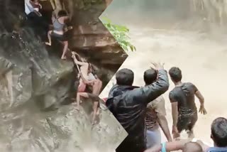 amidst strong current of water fall