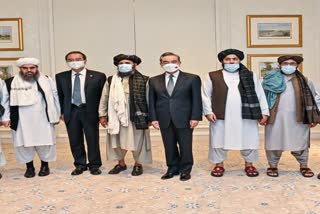 Chinese FM meets taliban delegation in doha