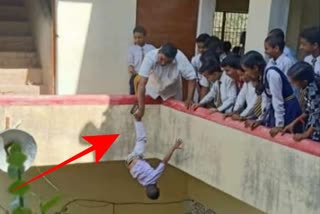 Principal hangs kid upside down from building in UP