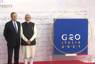 Prime Minister Narendra Modi arrives at G20 Summit venue in Rome. He is received by Italian Prime Minister Mario Draghi  Prime Minister Narendra Modi  prime minister narendra modi arrives at G20 Summit venue in Rome  t G20 Summit  റോമാ കൺവെൻഷൻ സെന്‍റർ  റോമാ കൺവെൻഷൻ സെന്‍ററിൽ എത്തി  ജി20 ഉച്ചകോടിക്കായി പ്രധാനമന്ത്രി റോമാ കൺവെൻഷൻ സെന്‍ററിൽ എത്തി  പ്രധാനമന്ത്രി റോമാ കൺവെൻഷൻ സെന്‍ററിൽ എത്തി  ഇറ്റാലിയൻ പ്രധാനമന്ത്രി  മരിയോ ഡ്രാഗി  (Mario Draghi  prime minister narendra modi  prime minister narendra modi arrives at G20 Summit venue  G20 Summit  G20  ജി20 ഉച്ചകോടി  ജി20  ഫ്രാൻസിസ് മാര്‍പാപ്പ  Pope Francis  അജിത് ഡോവൽ  പ്രധാനമന്ത്രിക്ക് ഇറ്റാലിയൻ പ്രധാനമന്ത്രിയുടെ സ്വീകരണം  prime minister narendra modi arrives at G20 Summit venue in rome