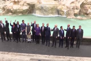 pm modi and G20 leaders walk around Trevi Fountain in rome