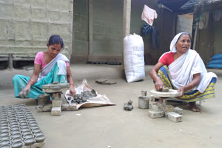 Earthen lamp making for diwali in Nalbari