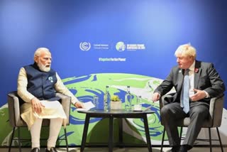 PM Modi meets UK counterpart at cop26