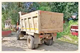 two soil-laden dumpers seized by palasbari police