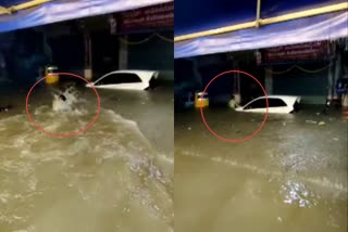 Heavy rain  Heavy rain lashed in Bengaluru  bengaluru rain  Young man crossing the road by Swimming in the rain water  waterlogging  ബെംഗളുരുവിൽ കനത്ത മഴ  വെള്ളക്കെട്ട്  വൈറൽ വീഡിയോ