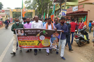 bjp rally in jhargram demanding reduce vat on petrol, diesel