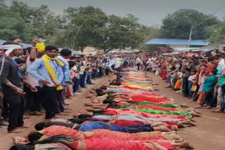 Childless women lie on the ground in the fair