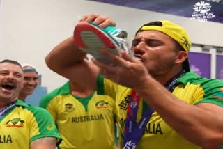 Australian team players drinking bear in shoe on world cup winning celebration