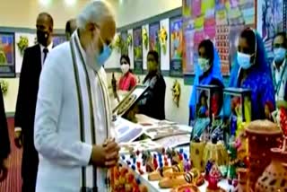 PM Modi meets tribal women