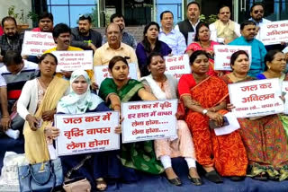 water tax policy of Jharkhand Mayor Protest in front of RMC office against water charges increase