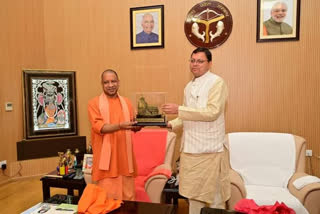 CM Dhami meet UP CM yogi