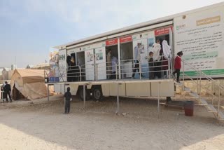 Mobile clinic offers care in Syria's remote camps