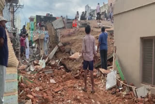 TWO BUILDINGS COLLAPSED TORRENTIAL RAIN IN AP