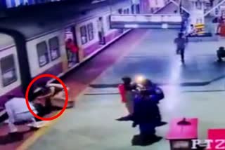 woman falls off moving train