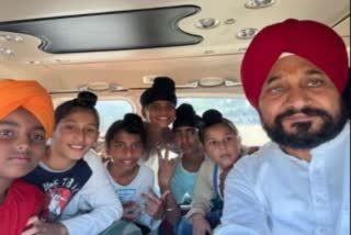 CM Charanjit Singh Channi with children in helicopter