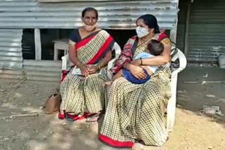 Anganwadi activist Covid test in check post with her baby