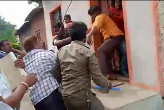 man beaten with broom by HESCOM officer