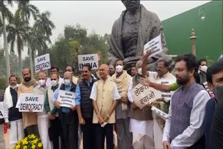 Rajyasabha Opposition   MPs protest against suspension of 12 parliamentarians